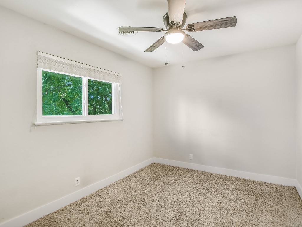 7617 Eastcrest Drive Austin, TX 78752 - Photo 17 of 20 an empty room with a window