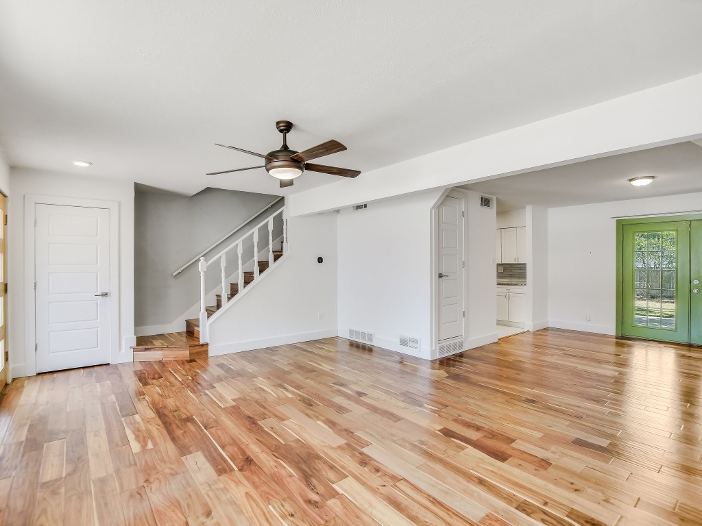 7617 Eastcrest Drive Austin, TX 78752 - Photo 5 of 20 a view of empty room with wooden floor and fan