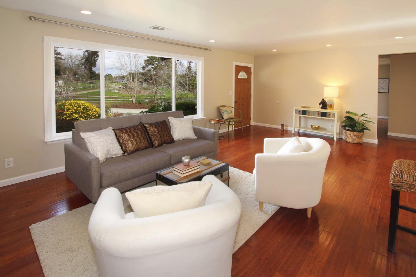 747 Calabasas Road Watsonville, CA 95076 - Photo 11 of 33 a living room with furniture and a large window
