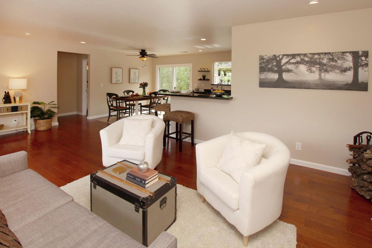 747 Calabasas Road Watsonville, CA 95076 - Photo 12 of 33 a living room with furniture and wooden floor