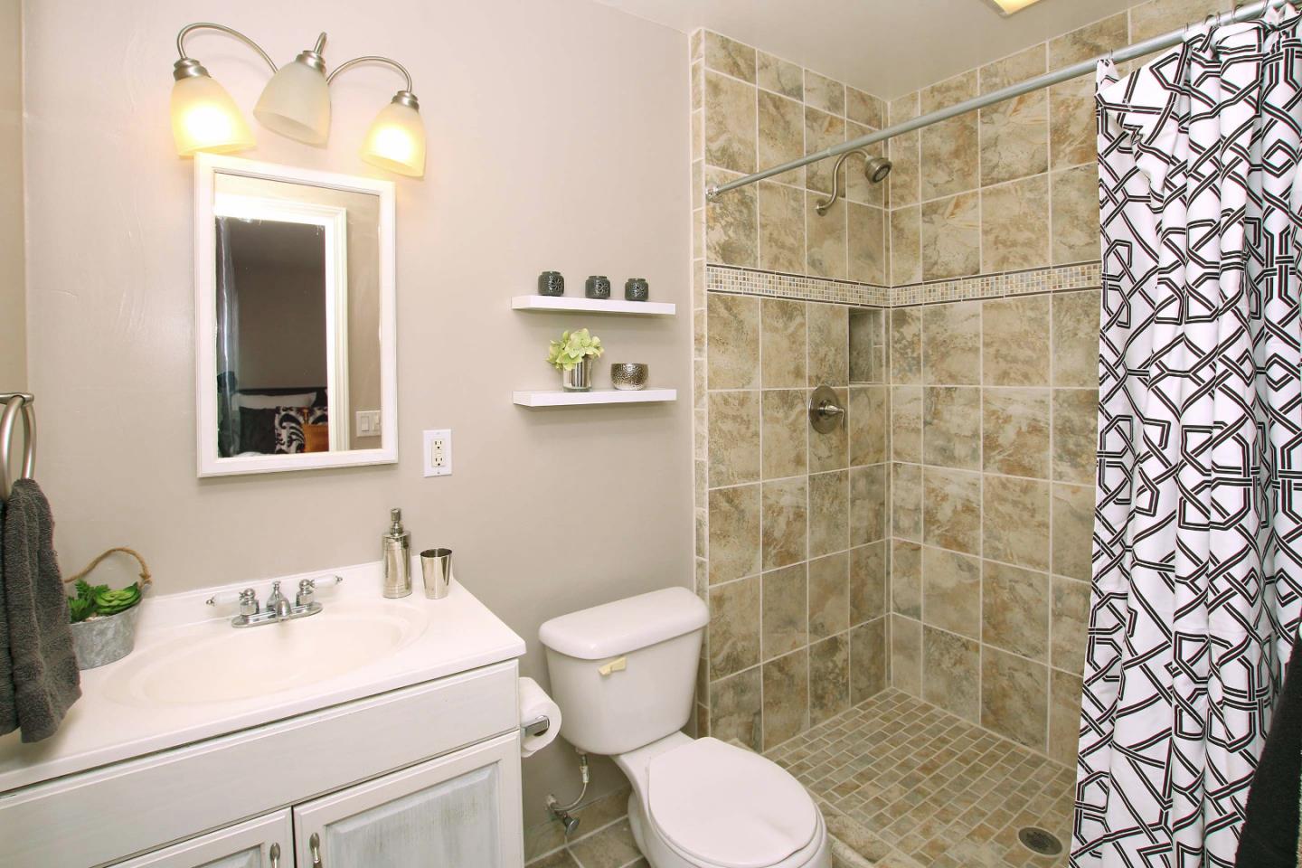747 Calabasas Road Watsonville, CA 95076 - Photo 16 of 33 a bathroom with a sink toilet and shower