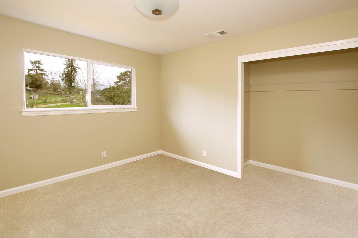 747 Calabasas Road Watsonville, CA 95076 - Photo 20 of 33 an empty room with a window