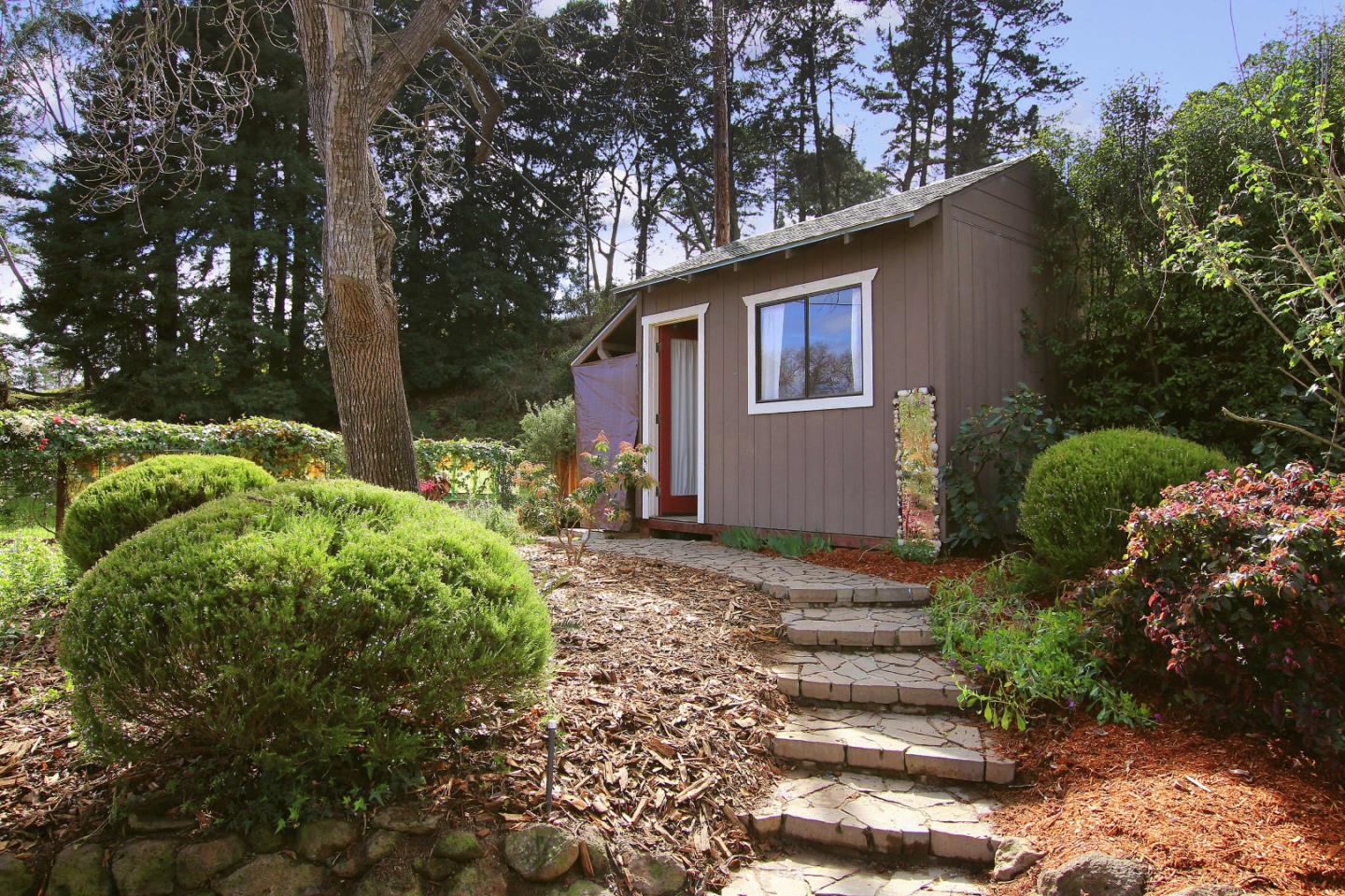 747 Calabasas Road Watsonville, CA 95076 - Photo 24 of 33 a backyard of a house with lots of green space