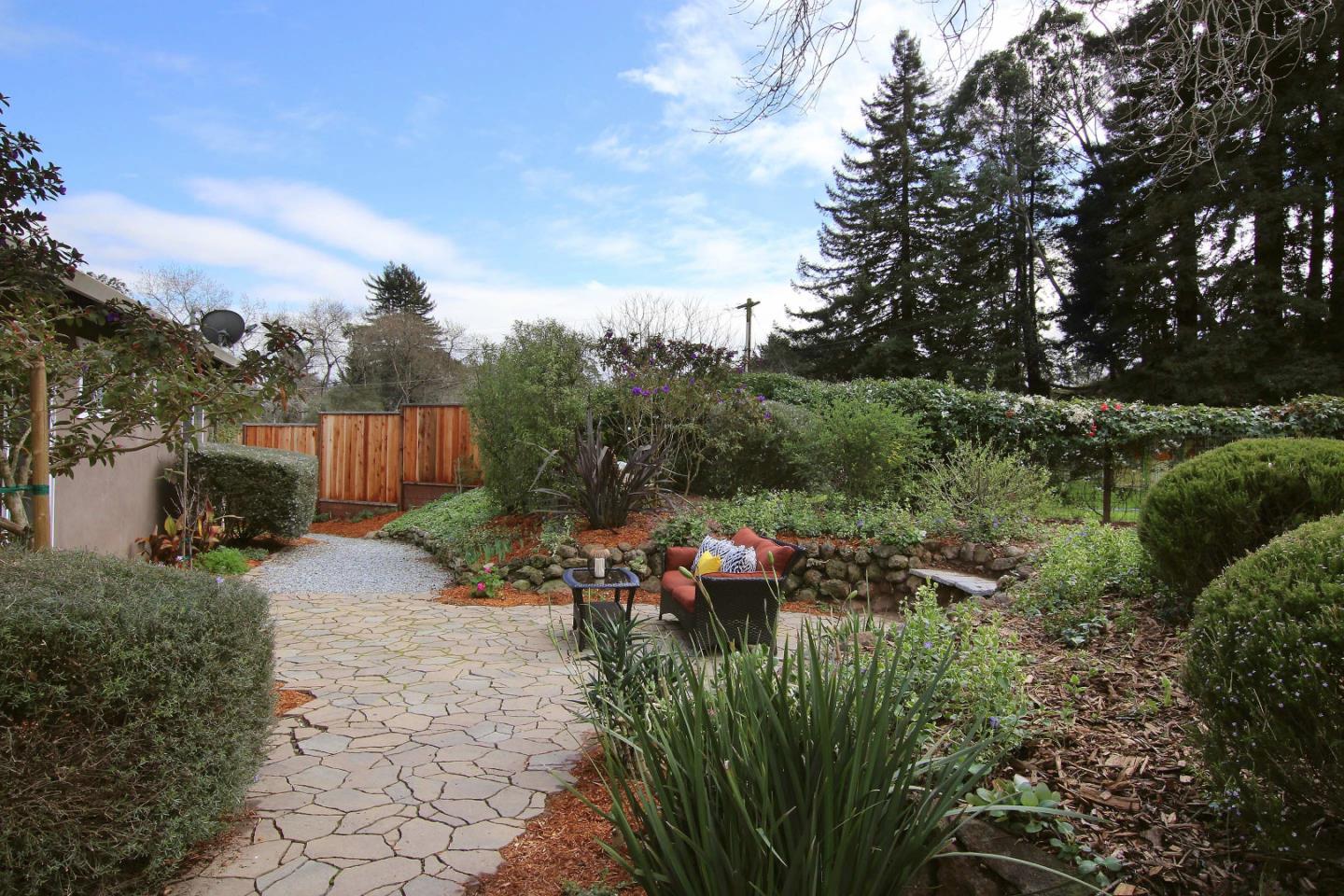 747 Calabasas Road Watsonville, CA 95076 - Photo 30 of 33 a view of a garden with plants and large trees