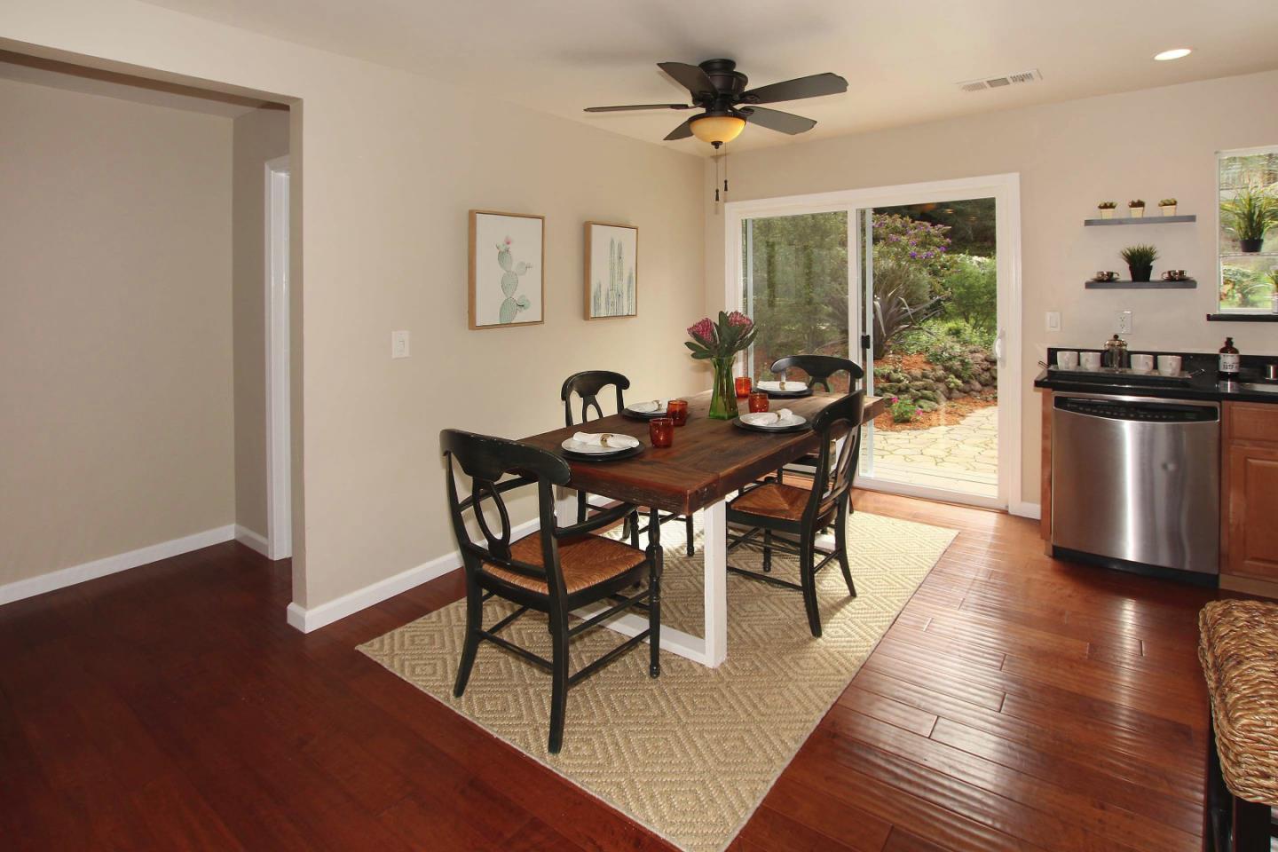 747 Calabasas Road Watsonville, CA 95076 - Photo 8 of 33 a view of a dining room with furniture window and wooden floor