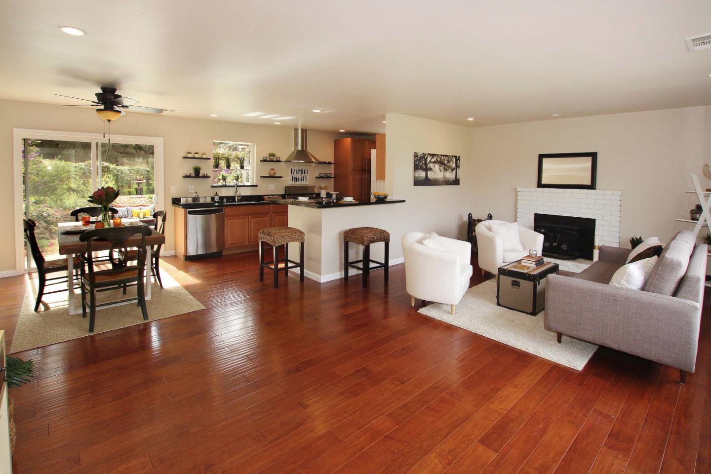 747 Calabasas Road Watsonville, CA 95076 - Photo 9 of 33 a living room with furniture and wooden floor