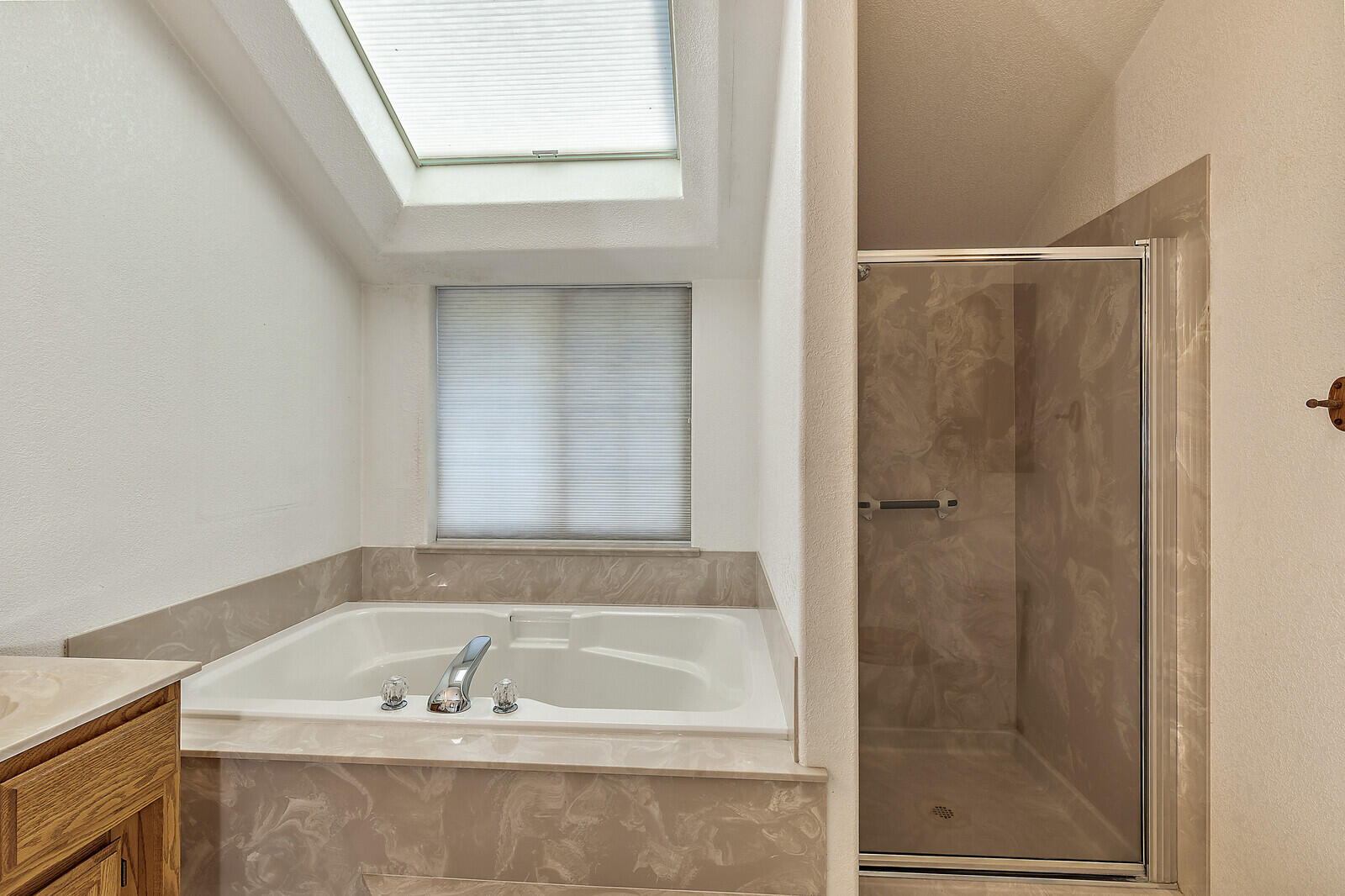7212 Lower River Road Grants Pass, OR 97526 - Photo 21 of 31 a bath tub sitting next to a bathroom sink