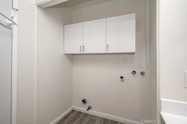 a view of small space with wooden floor