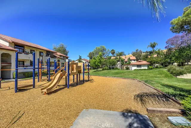 a view of a park with swings