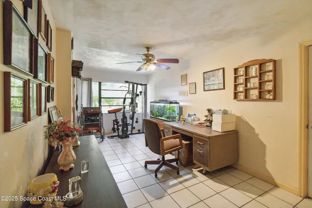 a view of a workspace with furniture and a livingroom