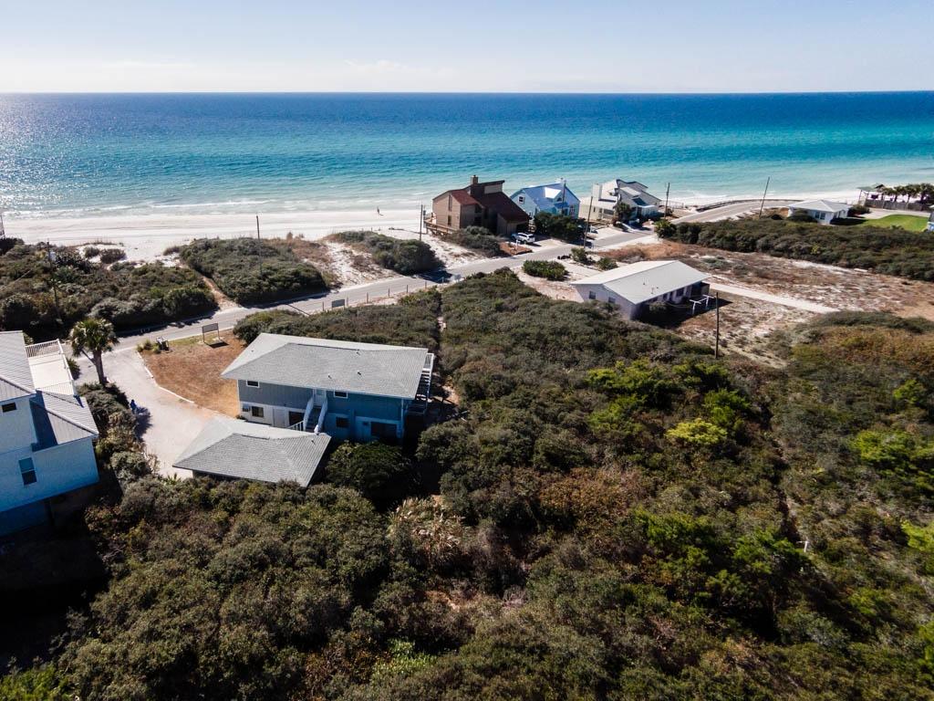 292-vacant 292-vacant Pompano Inlet Beach Inlet Beach, FL 32461 - Photo 2 of 13 an aerial view of a house with a yard and lake view