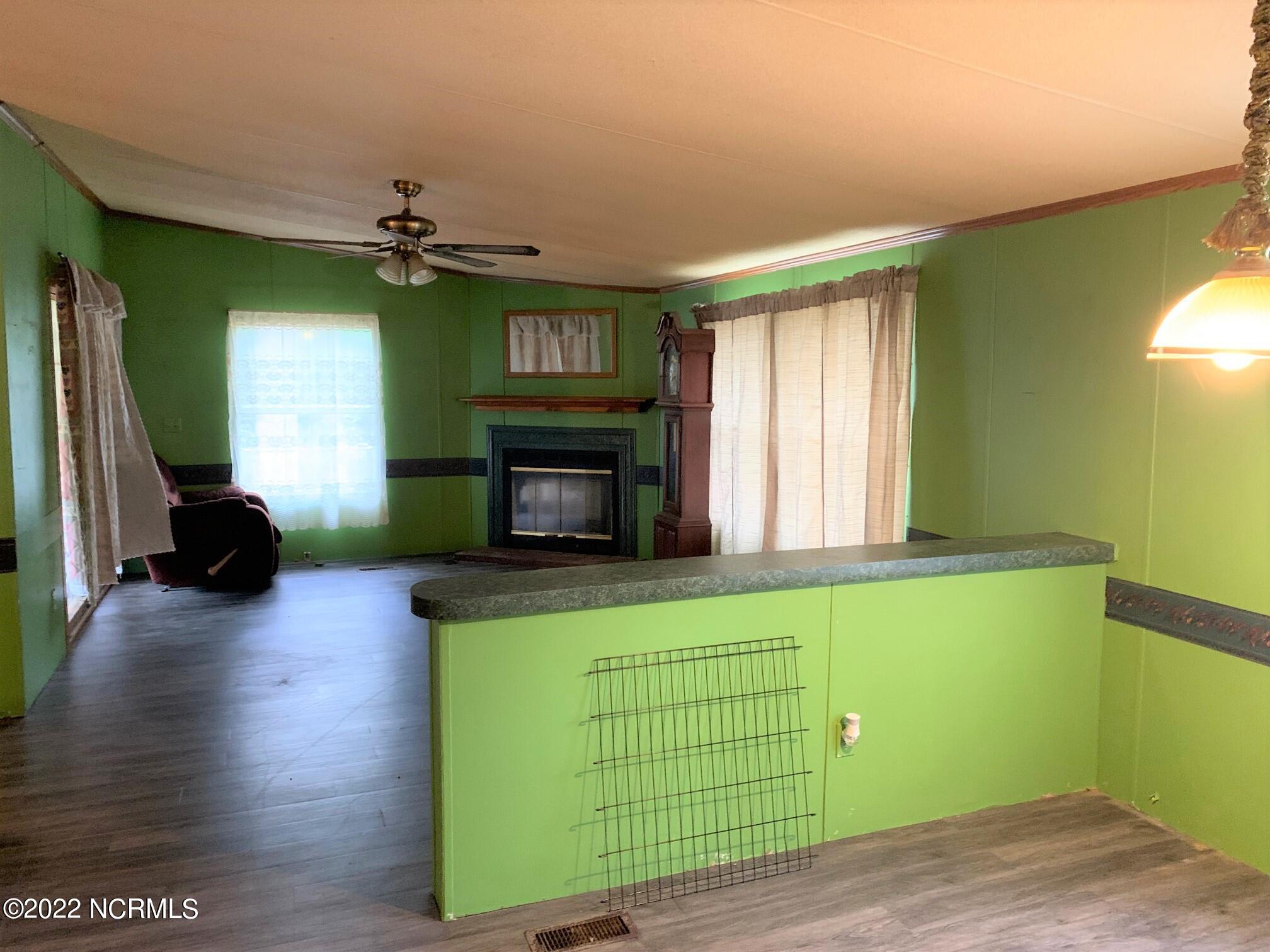 879 Herman Lane Road Stantonsburg, NC 27883 - Photo 4 of 16 Family Room & Dining Area