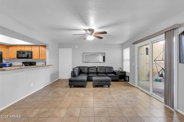 a kitchen with a sink appliances and a counter top space