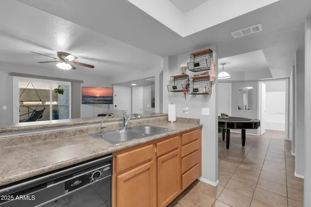a kitchen with a table chairs and microwave