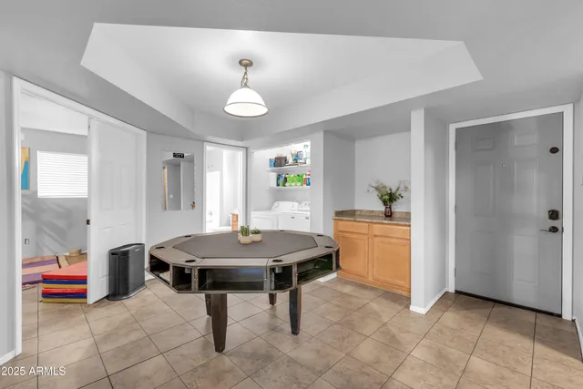a living room with furniture and a window
