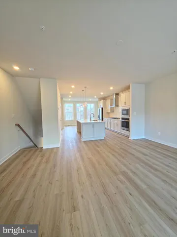 a bathroom with a granite countertop sink mirror and a