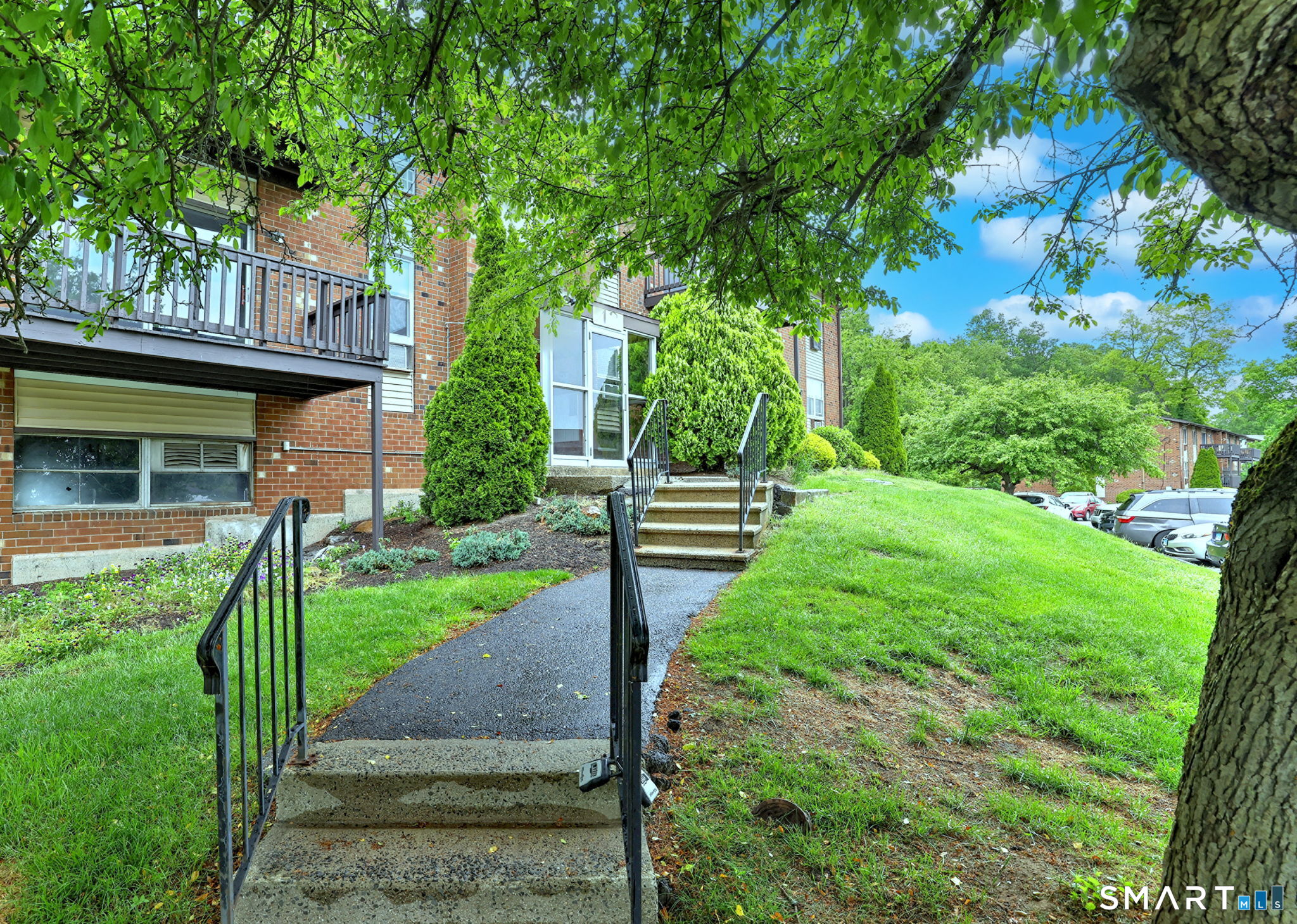 43 Balance Rock Road, Unit 11 Seymour, CT 06483 - Photo 6 of 40 a view of a garden with a house