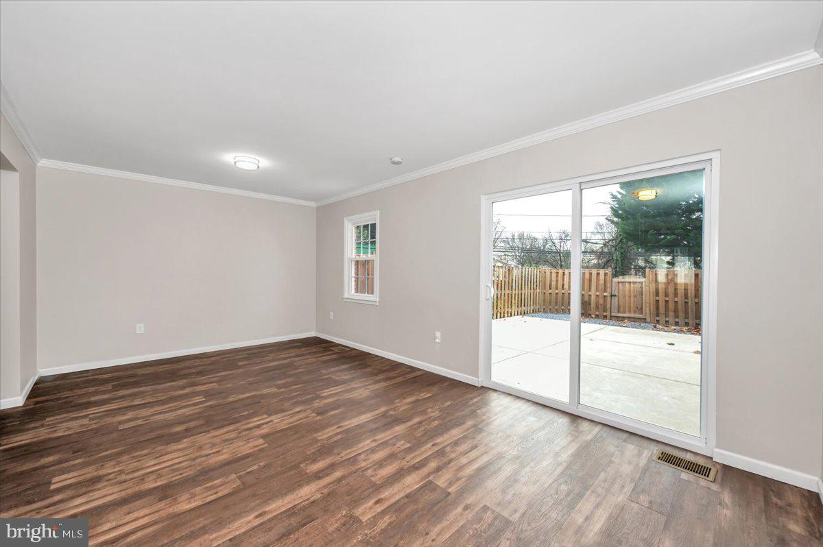 140 Gold Kettle Drive Gaithersburg, MD 20878 - Photo 12 of 35 a view of an empty room with wooden floor and a window