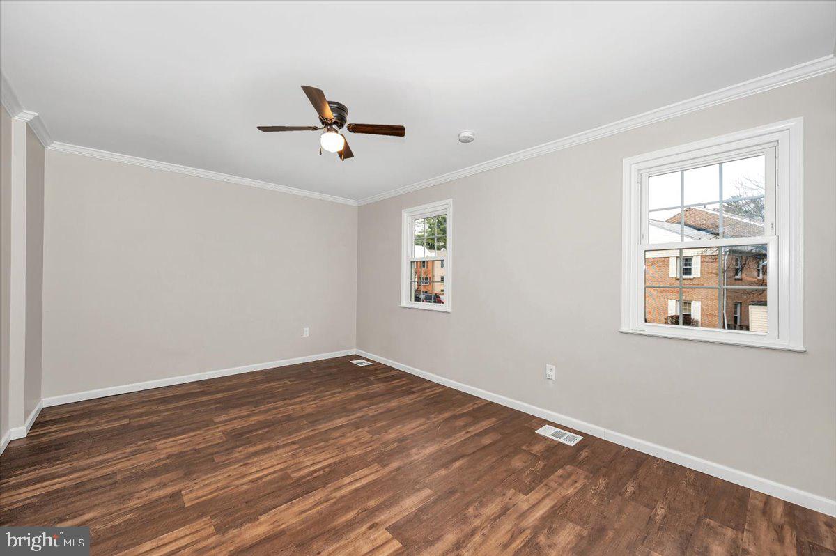 140 Gold Kettle Drive Gaithersburg, MD 20878 - Photo 14 of 35 a view of empty room with wooden floor and fan