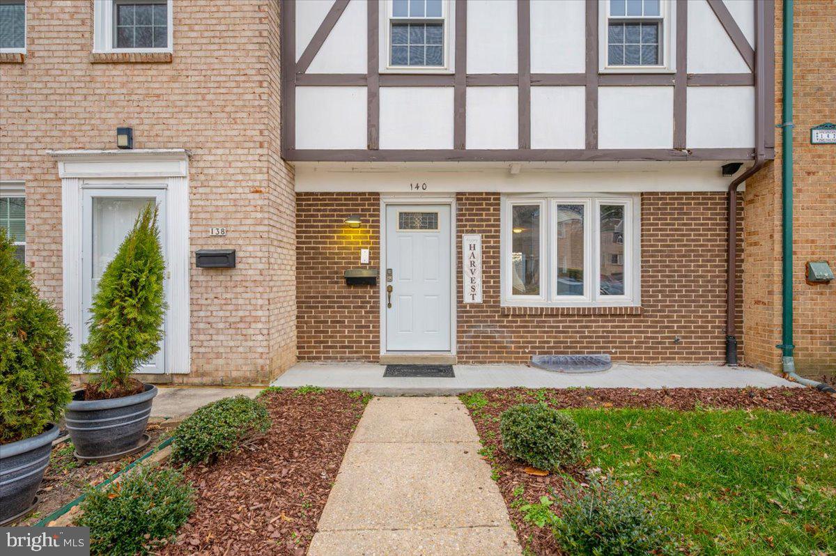 140 Gold Kettle Drive Gaithersburg, MD 20878 - Photo 2 of 35 a front view of a house with a garden