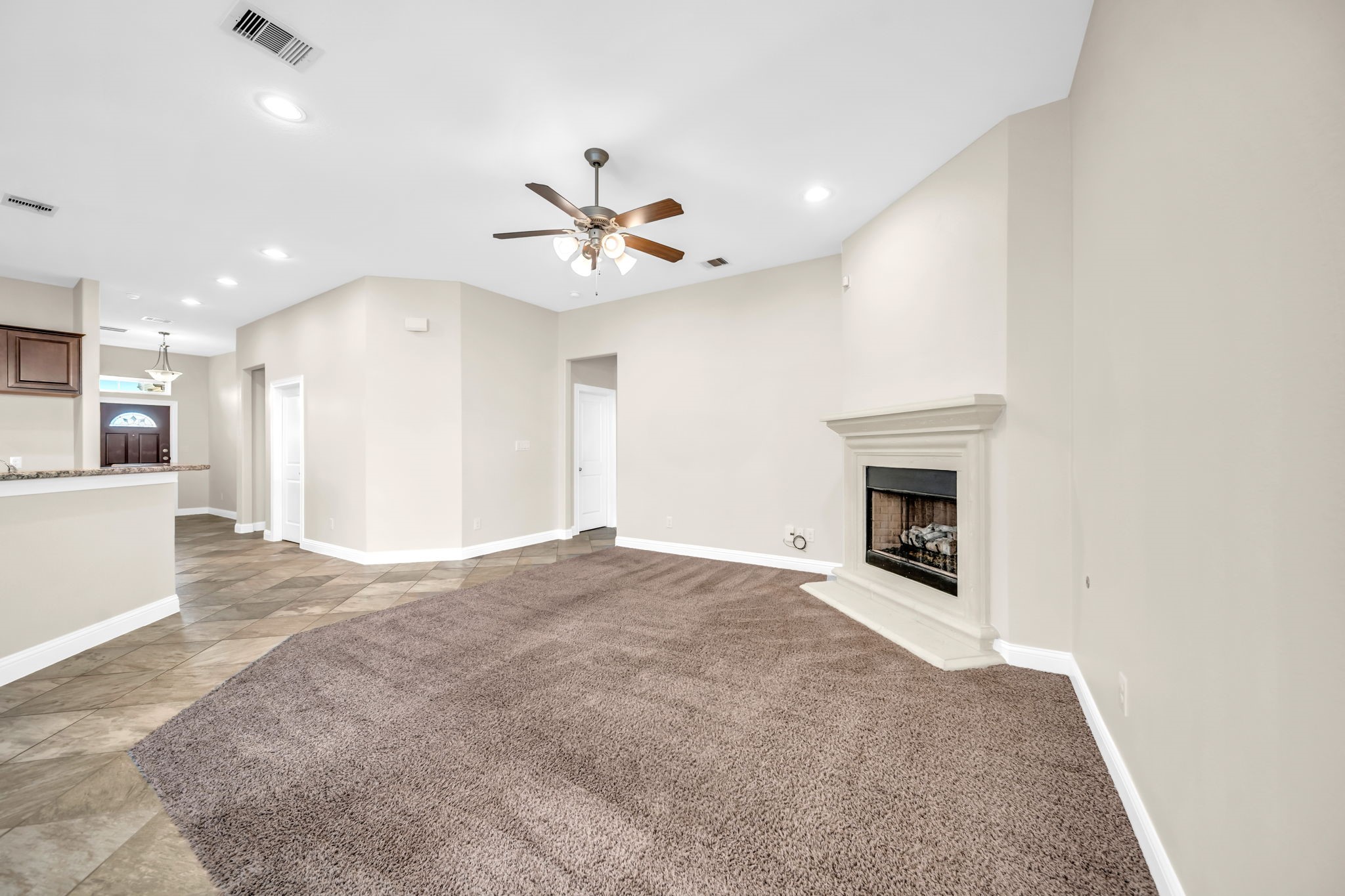 19043 Minero Lane Montgomery, TX 77356 - Photo 11 of 26 Truly open concept living where all common areas open to one another.