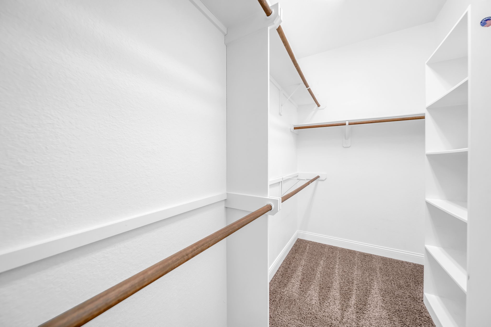 19043 Minero Lane Montgomery, TX 77356 - Photo 14 of 26 Primary walk in closet with built in shelves