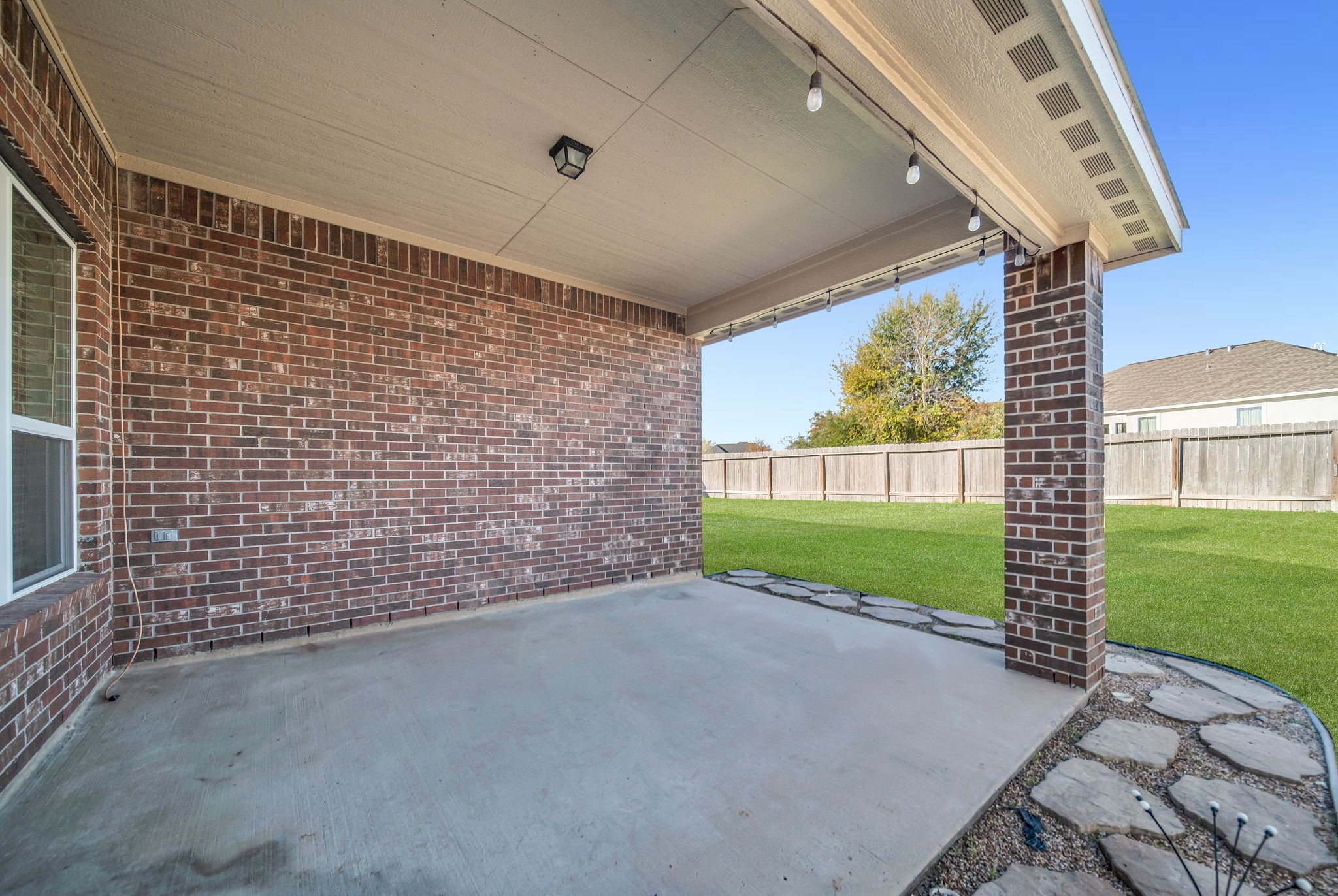 19043 Minero Lane Montgomery, TX 77356 - Photo 20 of 26 Covered back patio looks out to back yard.