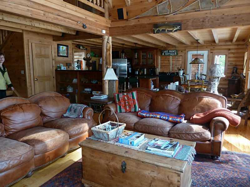 10 Mason's Cove Road Lovell, ME 04051 - Photo 7 of 34 Living Room. Living area is central...