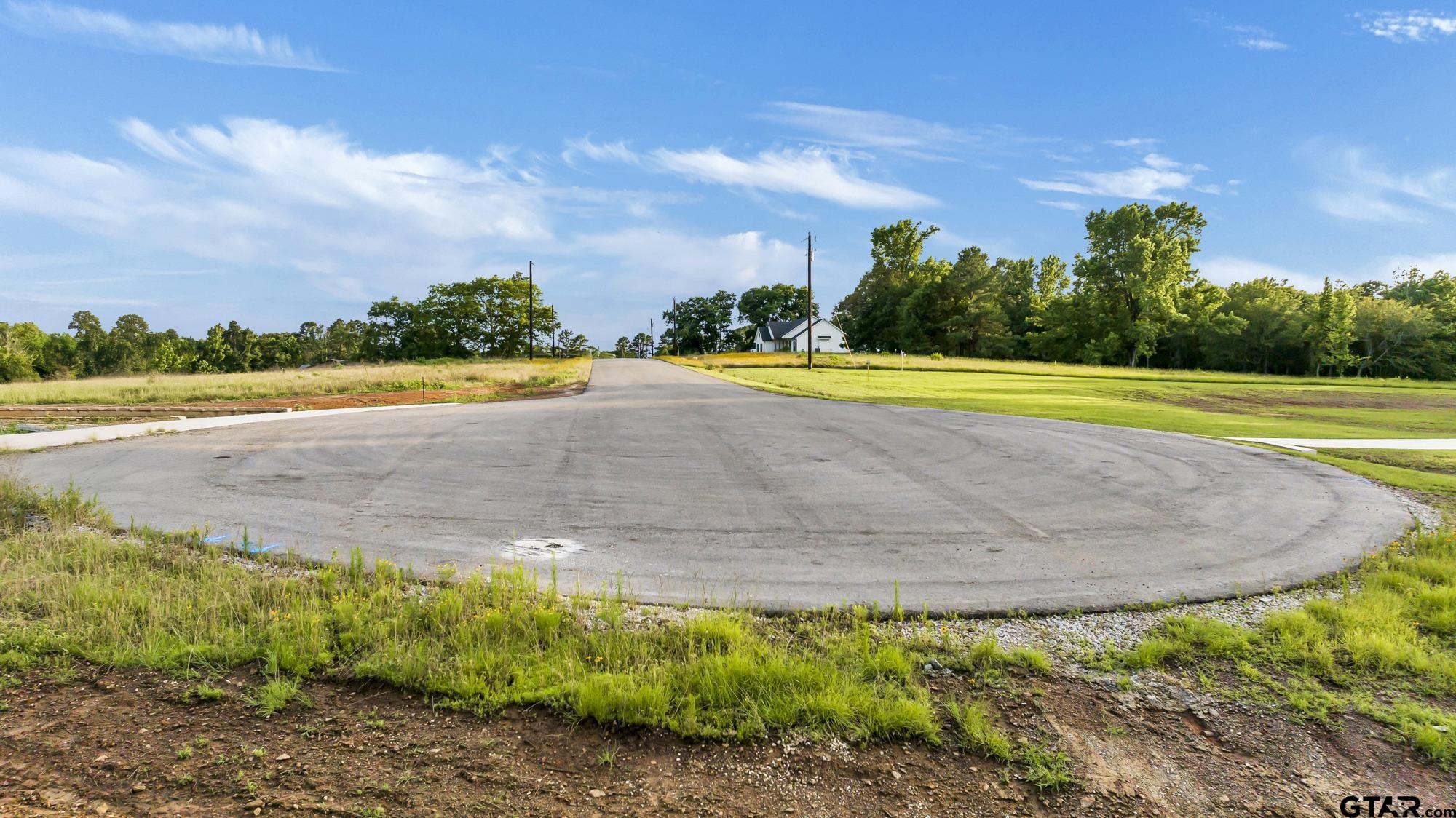 Lot 7 Ridgeway Court Winona, TX 75792 - Photo 6 of 7 a view of a swimming pool with an outdoor space and seating area