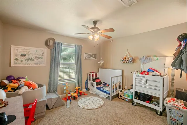 a storage room with lots of chairs