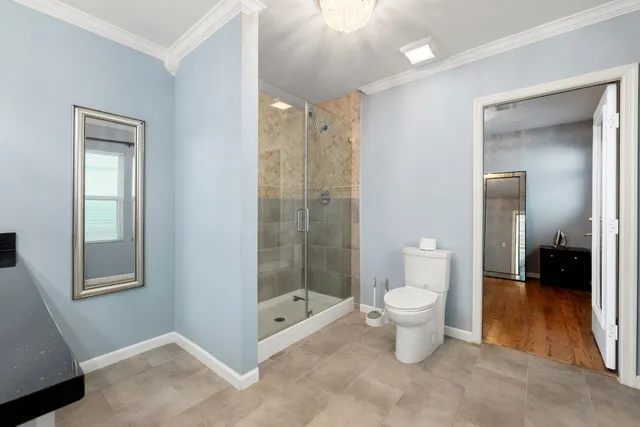 a view of a hallway with washer and dryer