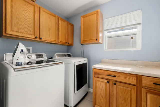 a view of a chair and table in the balcony