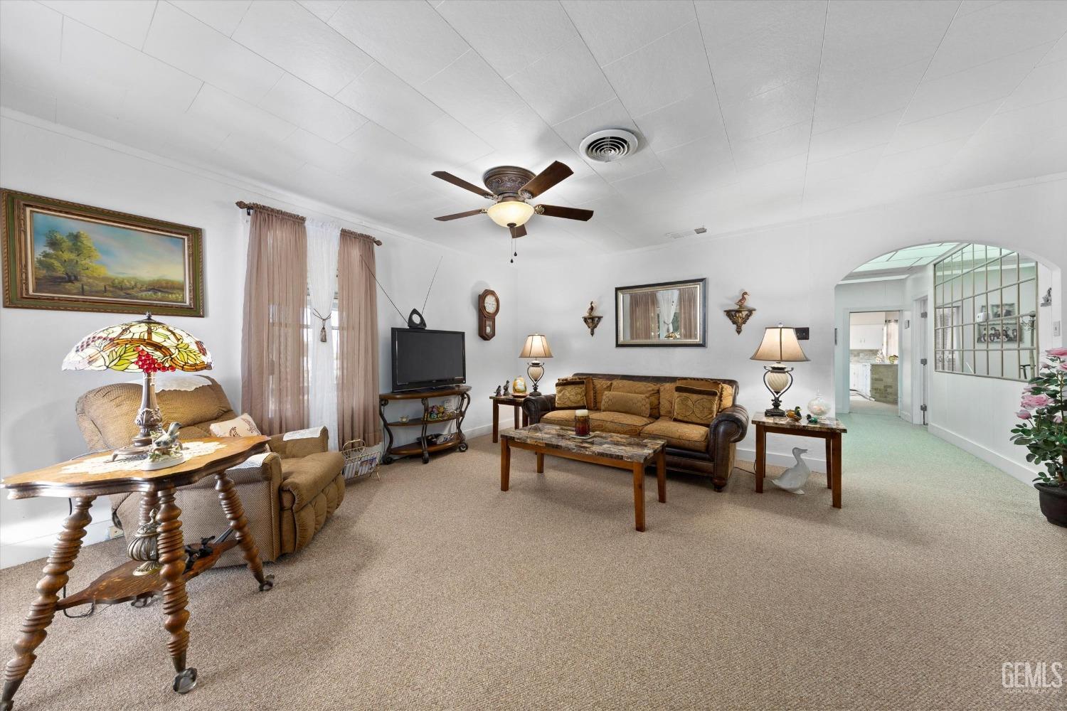 Undisclosed Address Taft, CA 93268 - Photo 11 of 44 a living room with furniture