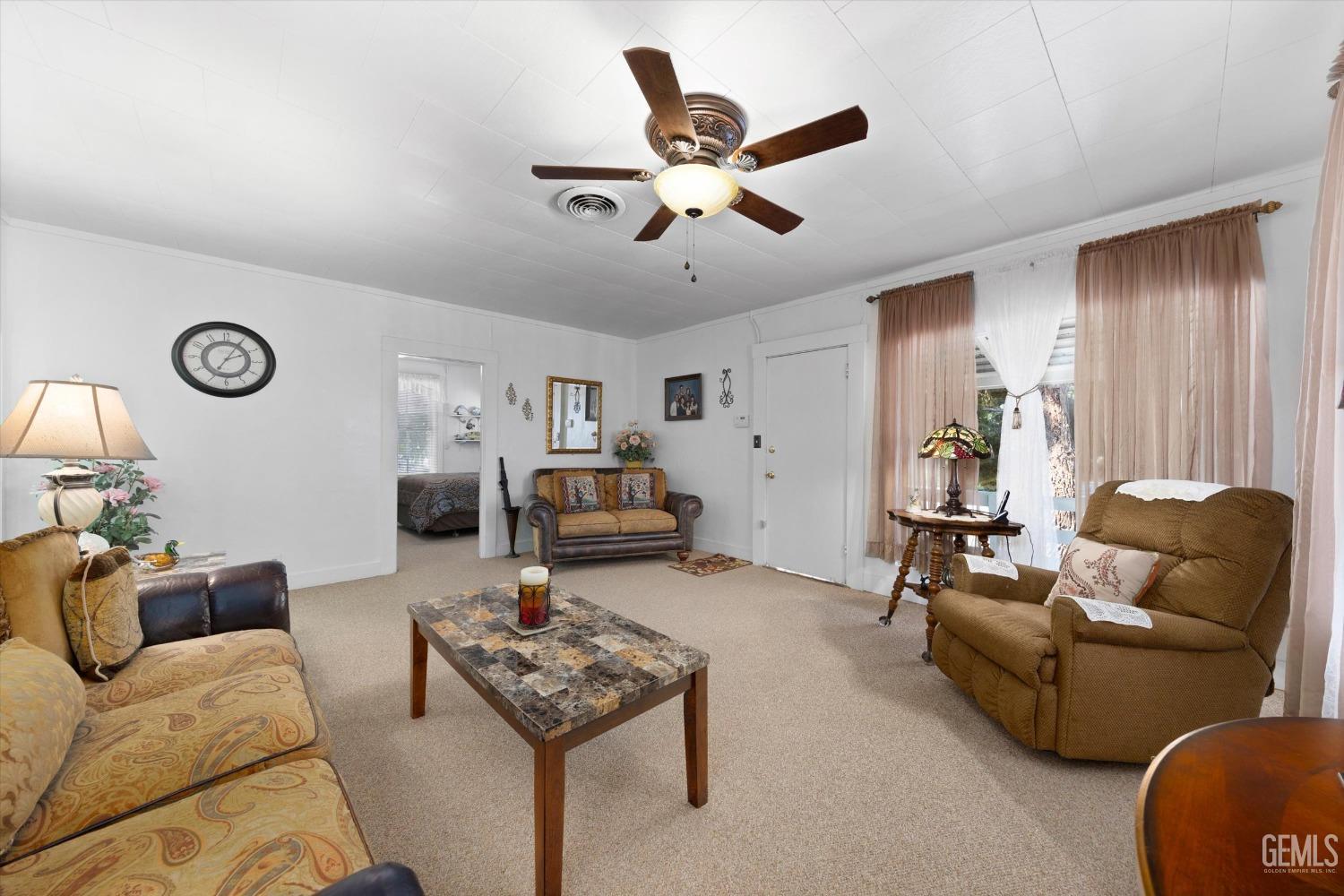 Undisclosed Address Taft, CA 93268 - Photo 14 of 44 a living room with furniture