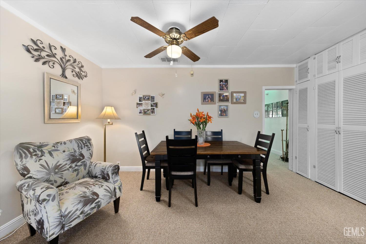 Undisclosed Address Taft, CA 93268 - Photo 15 of 44 a view of a livingroom with furniture and a potted plant