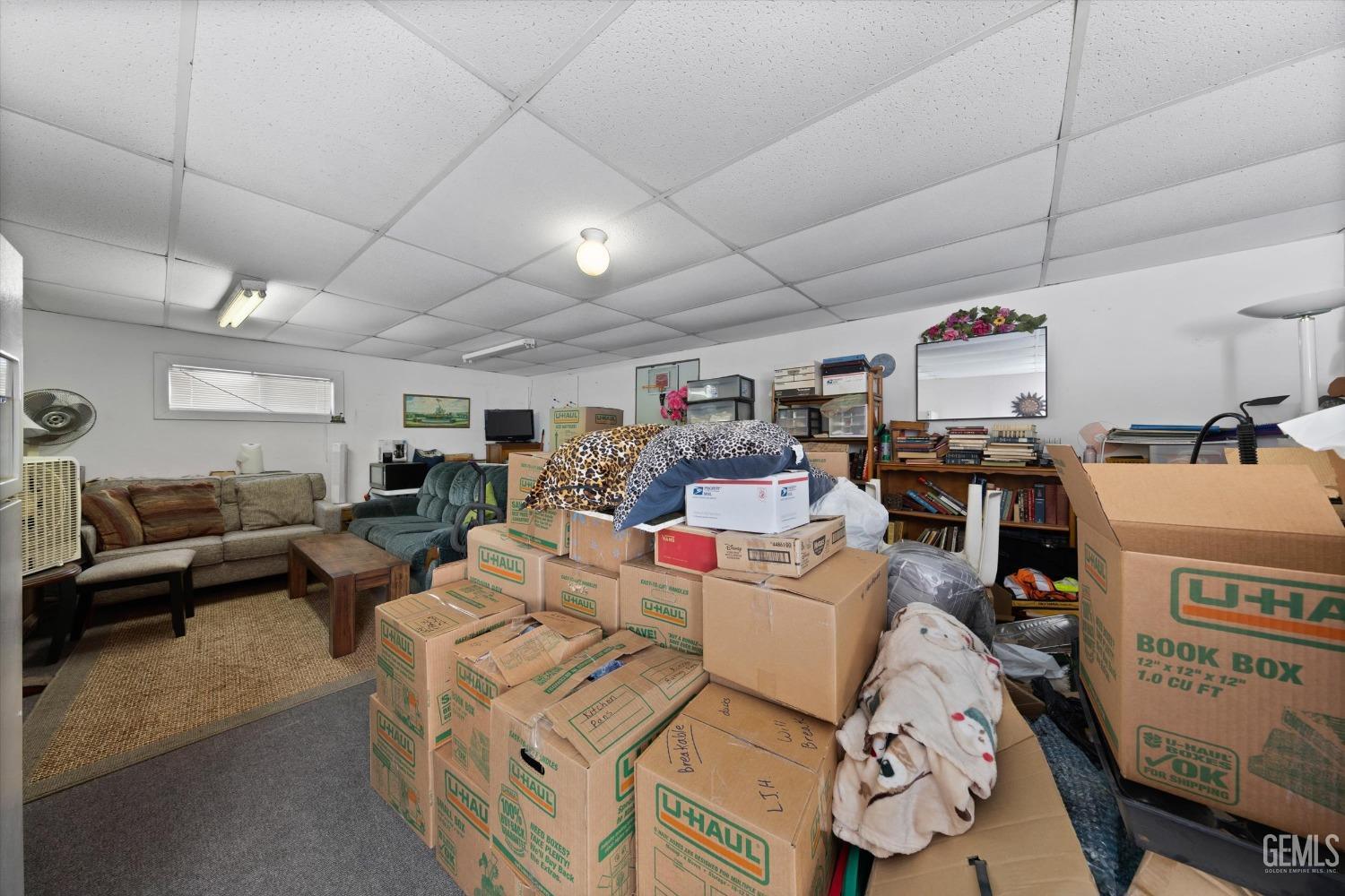 Undisclosed Address Taft, CA 93268 - Photo 37 of 44 a living room with furniture and a flat screen tv