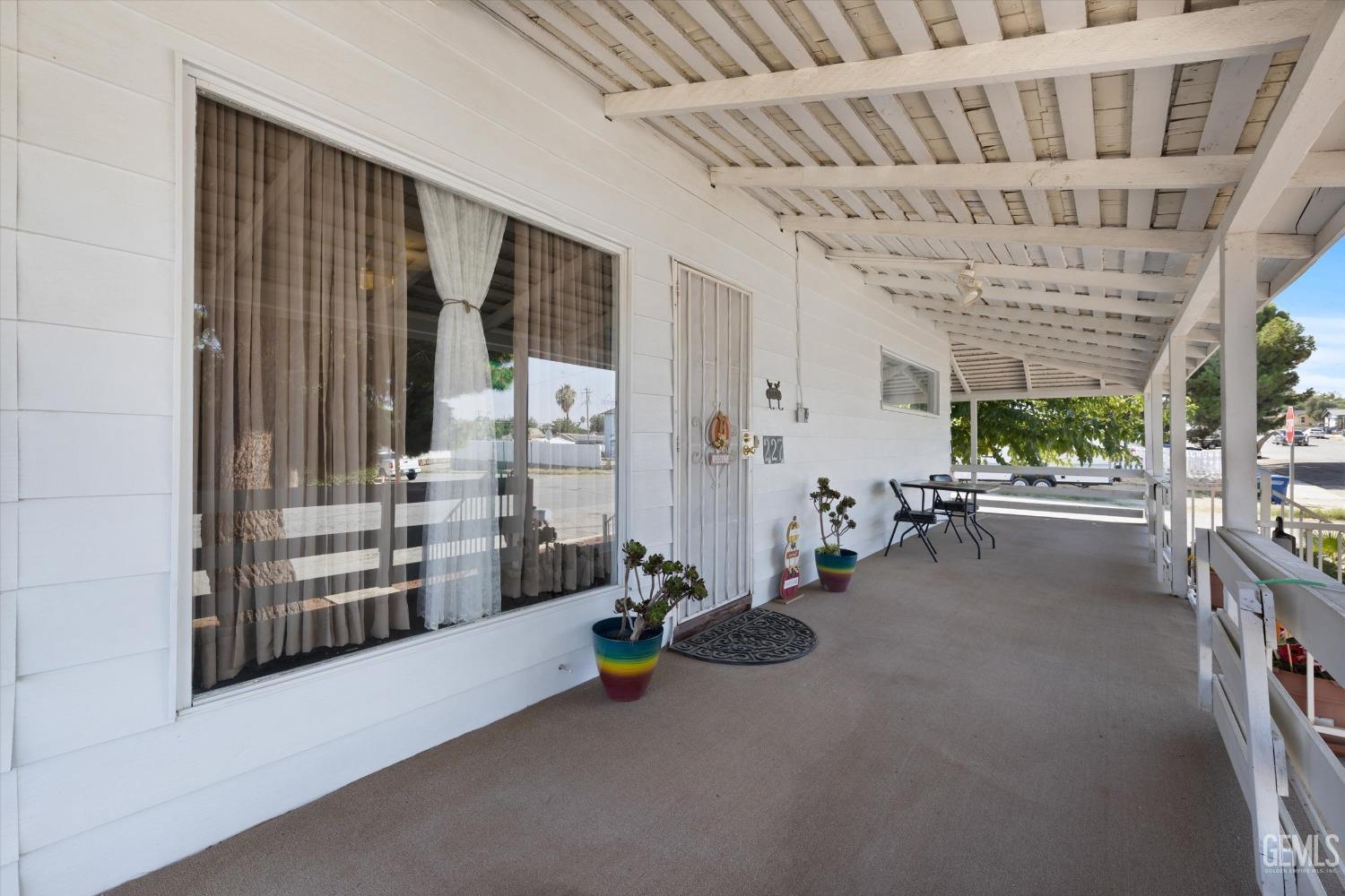 Undisclosed Address Taft, CA 93268 - Photo 10 of 44 a view of a hallway with seating area