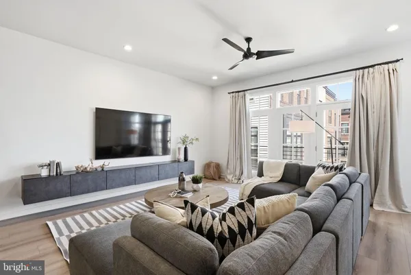 a living room with furniture and a table