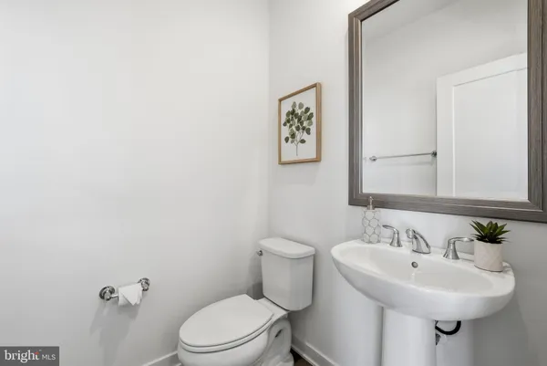 a view of a hardwood & utility room