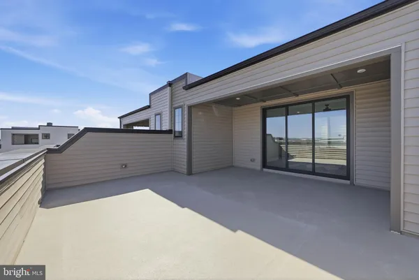 a bathroom with a sink mirror and toilet