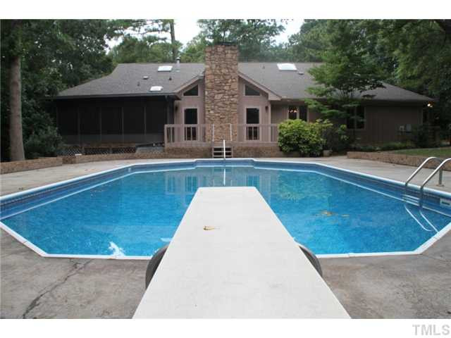 8516 Kempton Road Raleigh, NC 27615 - Photo 1 of 15 View of the back home from diving board.