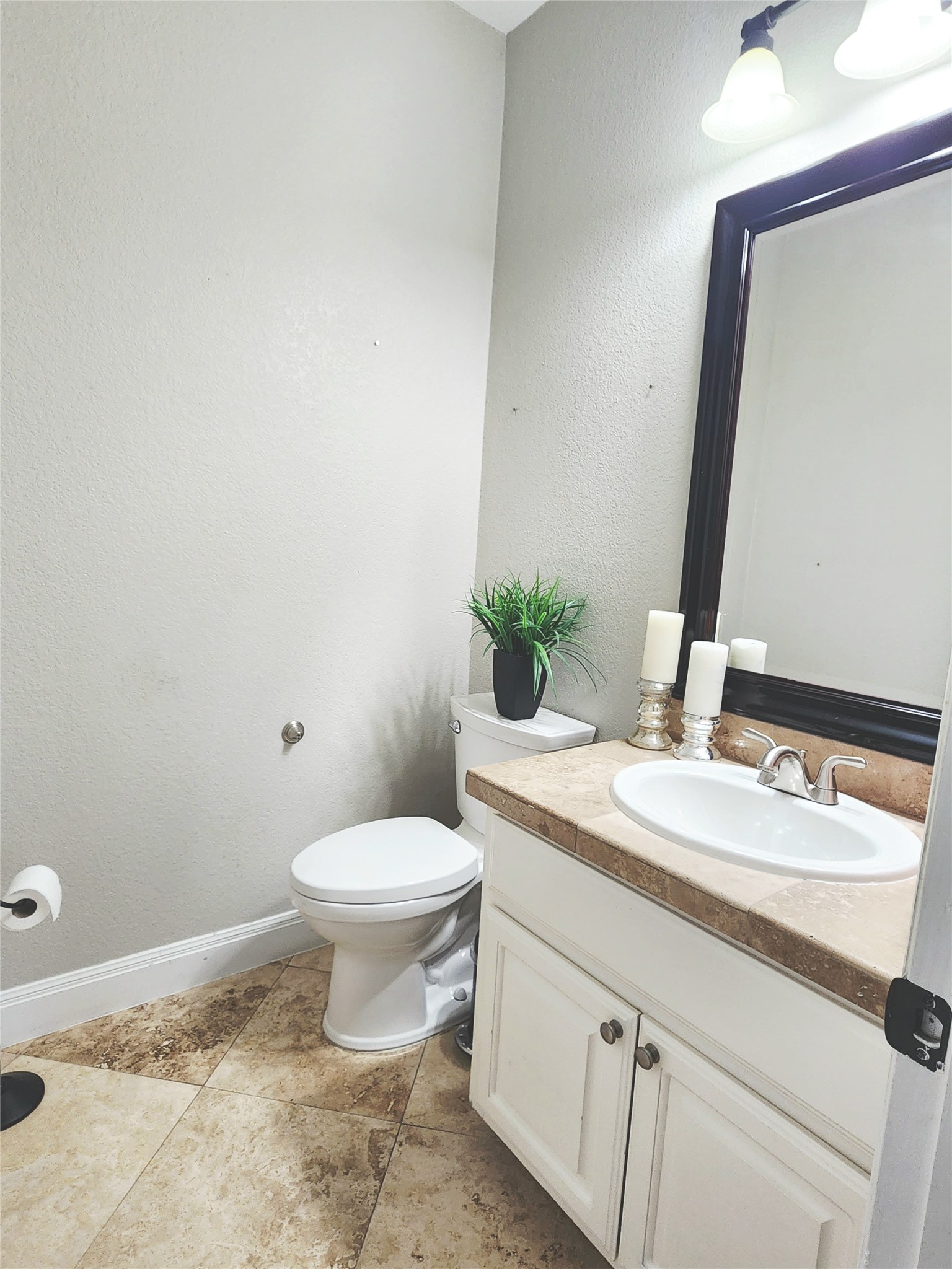 152 Silver Hawk Court Dripping Springs, TX 78620 - Photo 7 of 31 a bathroom with a sink and a toilet