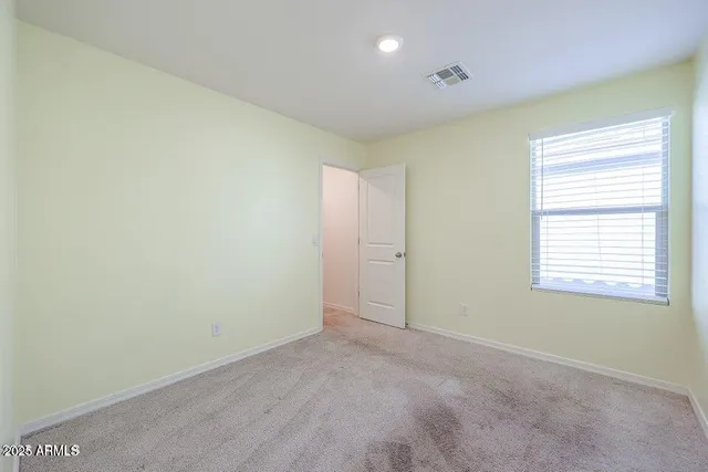 an empty room with a window