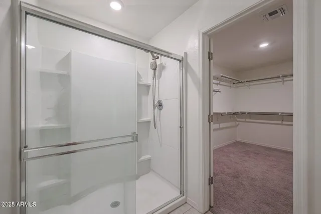 a view of an empty walk in closet