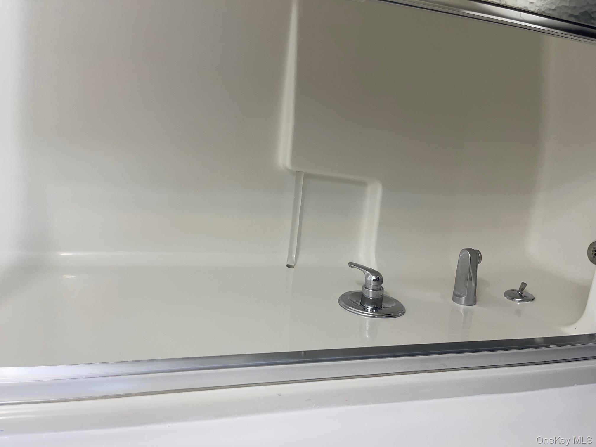 57 Ashland Street, Unit 2 New Rochelle, NY 10801 - Photo 9 of 19 Full bathroom featuring tub / shower combination