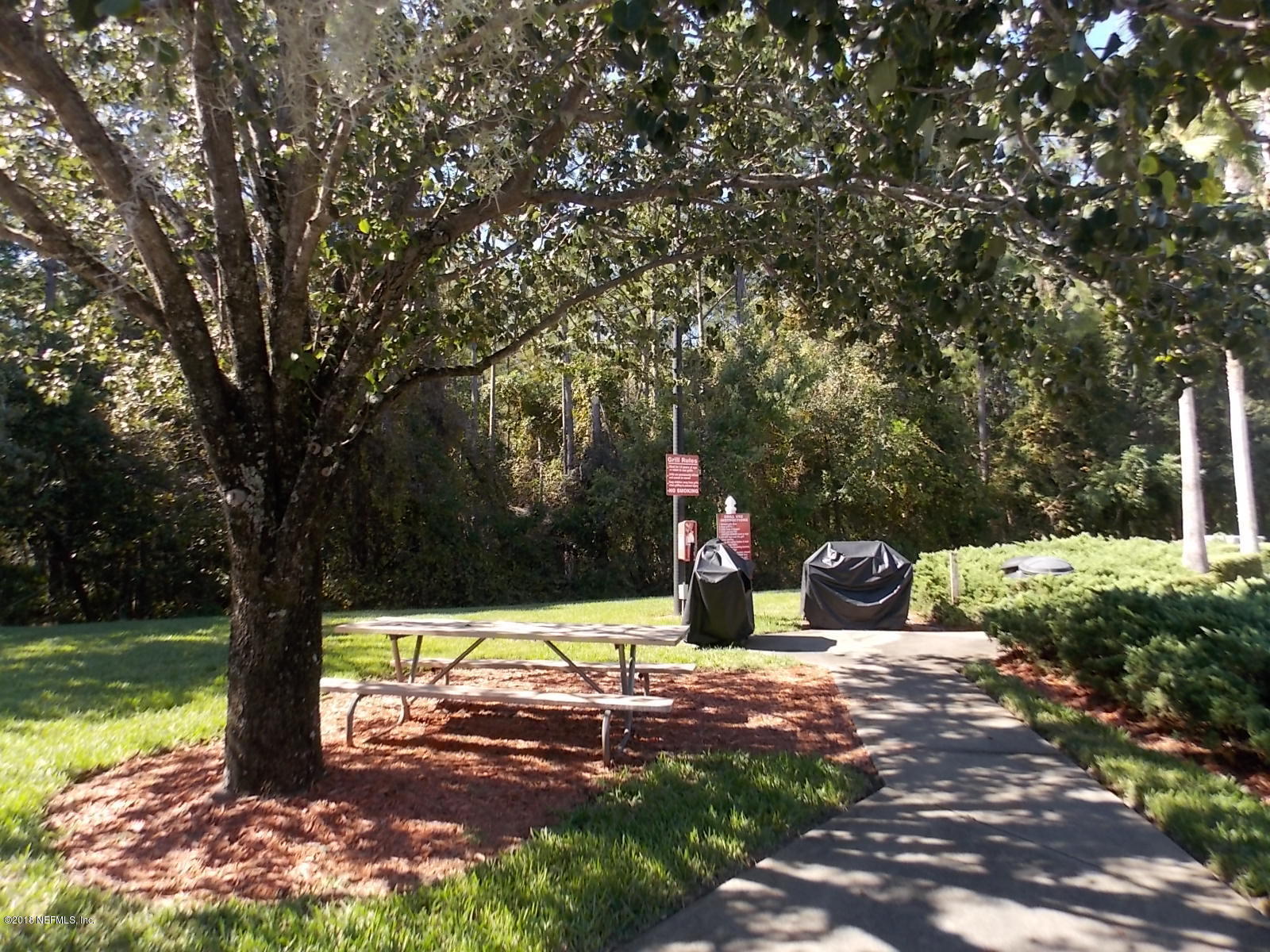 10550 Baymeadows Road, Unit 125 Jacksonville, FL 32256 - Photo 20 of 22 Grilling Area Across from Condo