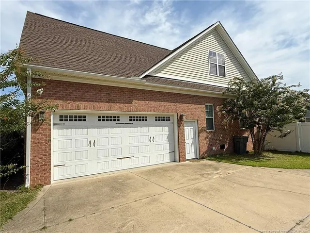 a view of a house with a garage