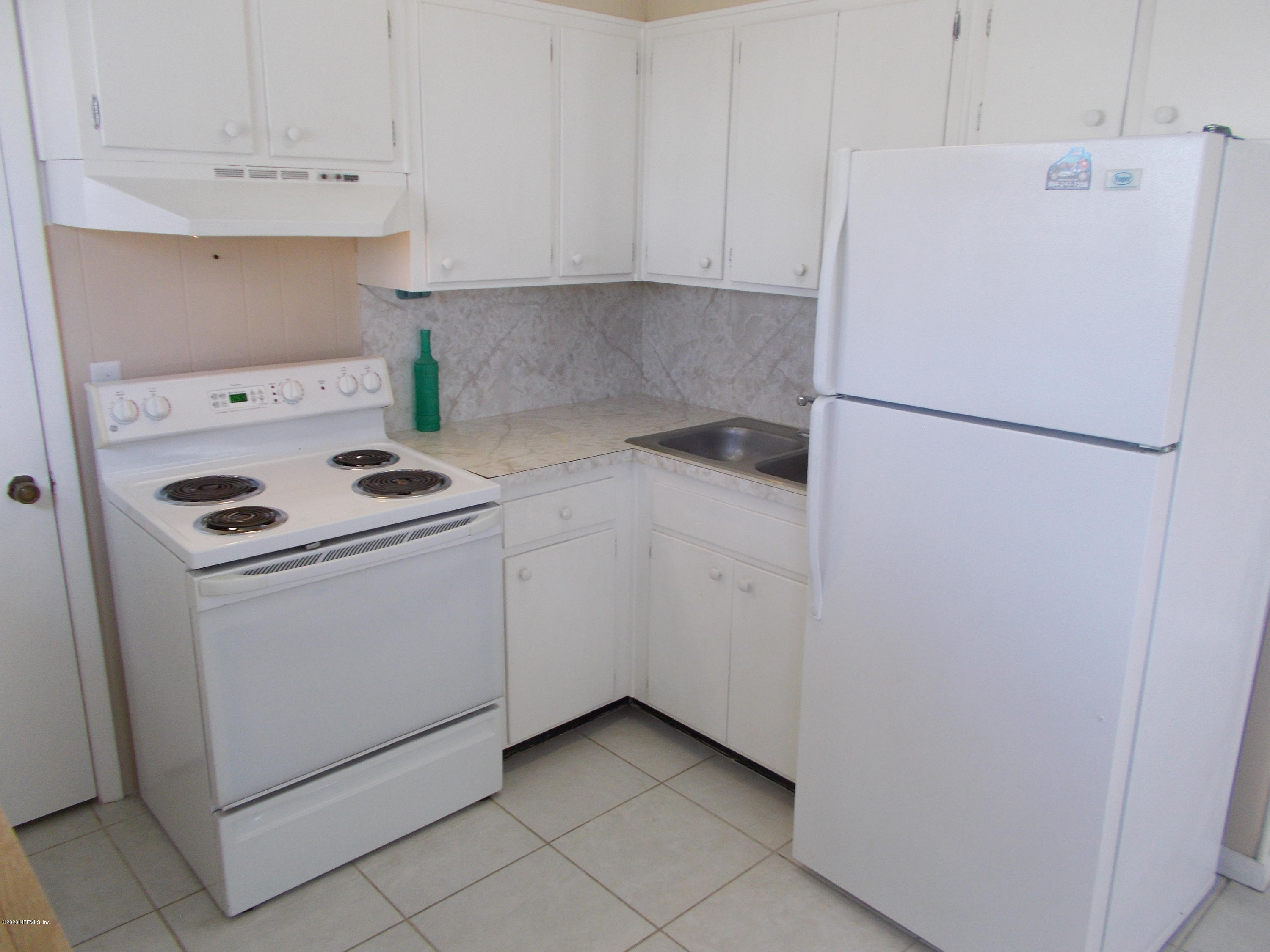 1500 First Street, Unit B Neptune Beach, FL 32266 - Photo 5 of 13 a utility room with dryer and washer
