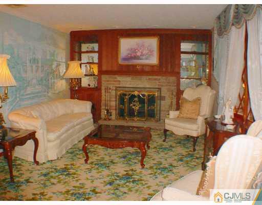 36 Mageira Street South River, NJ 08882 - Photo 2 of 10 a living room with furniture and a fireplace