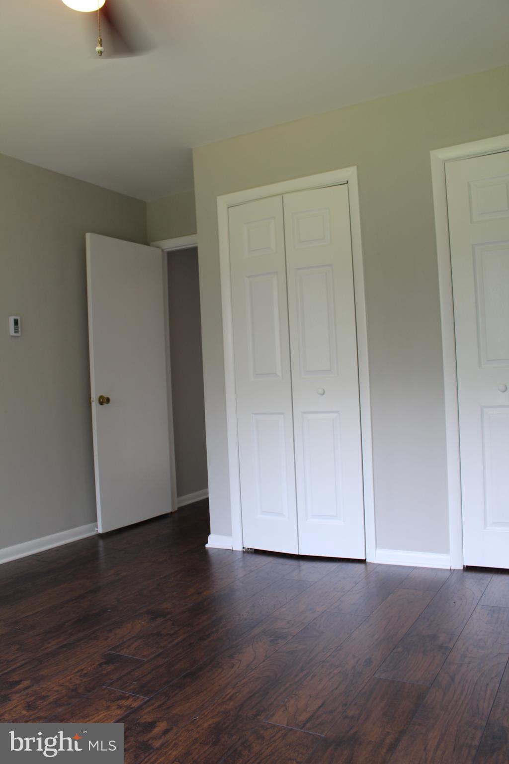110 Griffith Road, Unit 2 Delta, PA 17314 - Photo 3 of 6 a view of an empty room with wooden floor